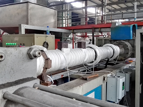 Chauffage par Induction pour les Machines de Traitement des Plastiques